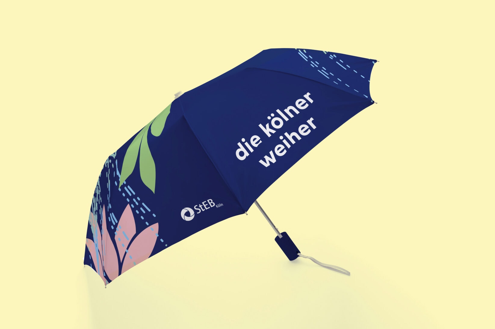 Ein Regenschirm mit dem Logo und Illustrationen der neuen Marke